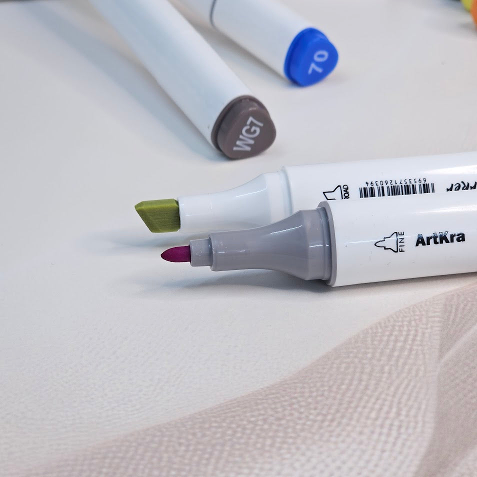 Front view of the Usmile Toys 'ArtKra Marker' 48-piece set, showcasing numerous colorful marker pens neatly arranged in a portable clear case with a handle."